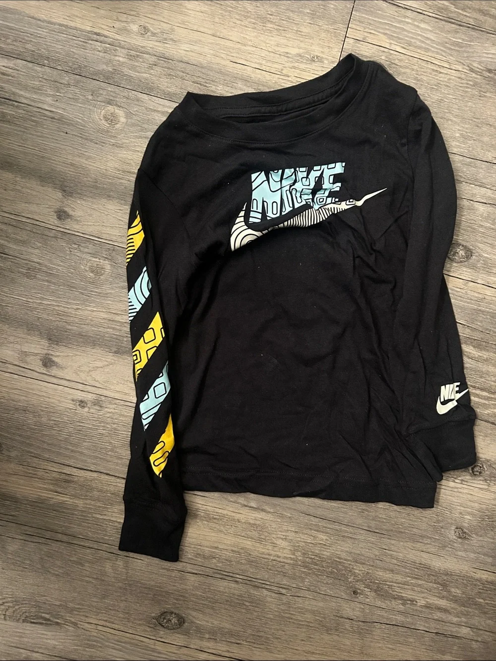 Nike Black Long Sleeve Tee with Blue and Cream Swoosh
